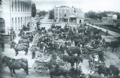 Early view of the market behind the first city hall